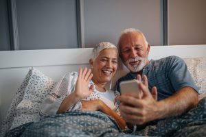 Couple using technology to stay in touch.